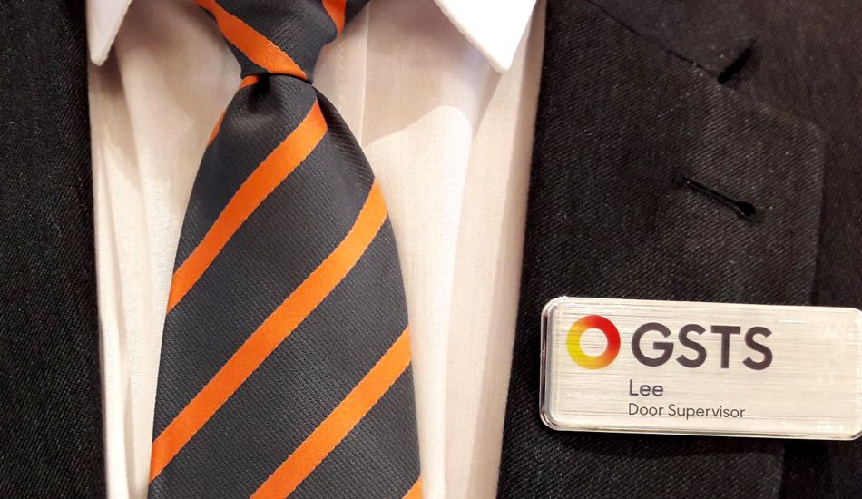 A tie showing GSTS security employee